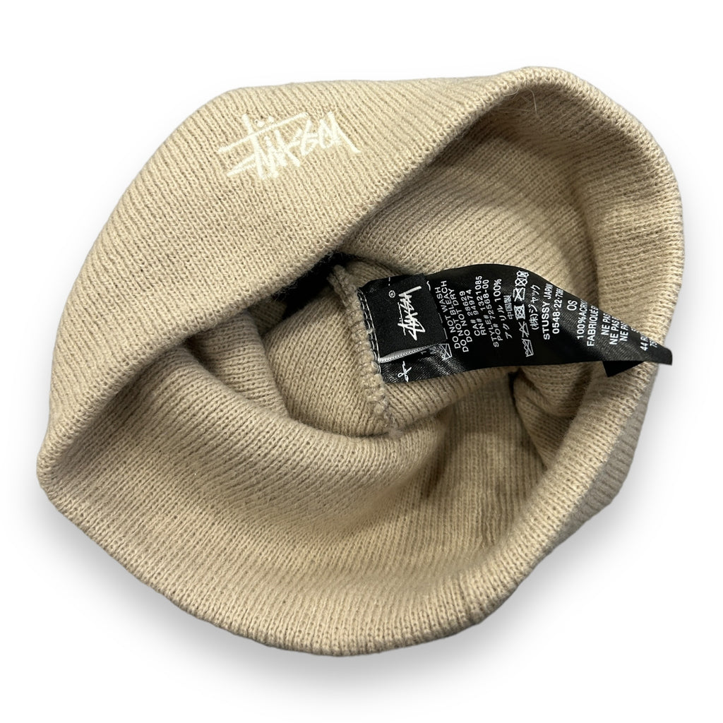 Cream Stussy Spellout Skully Hat