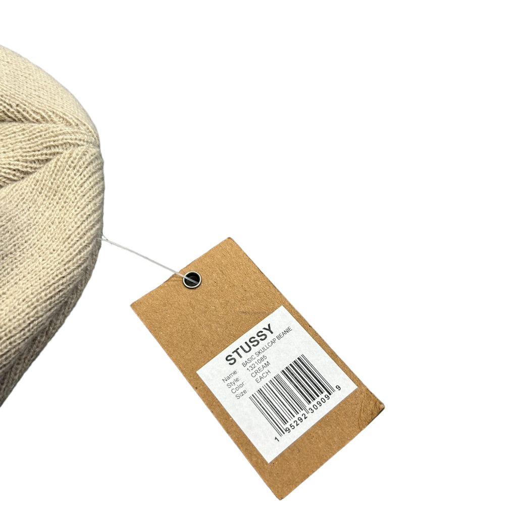 Cream Stussy Spellout Skully Hat