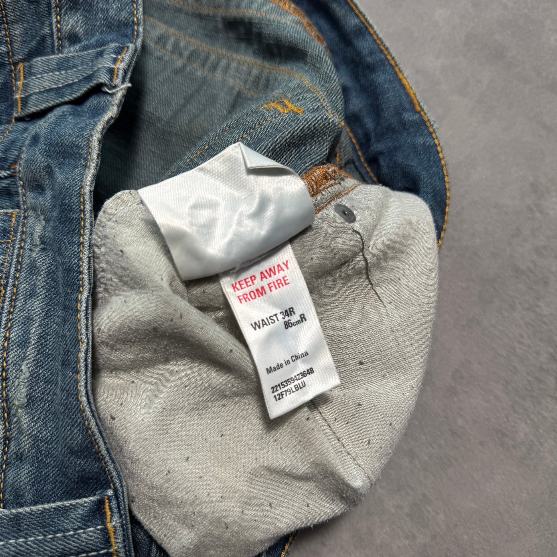 Distressed Denim Jeans (34w)